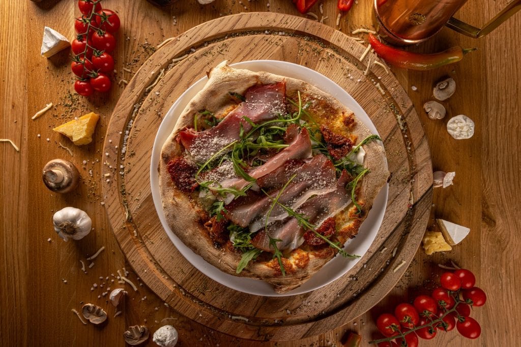 overhead view of a gourmet pizza